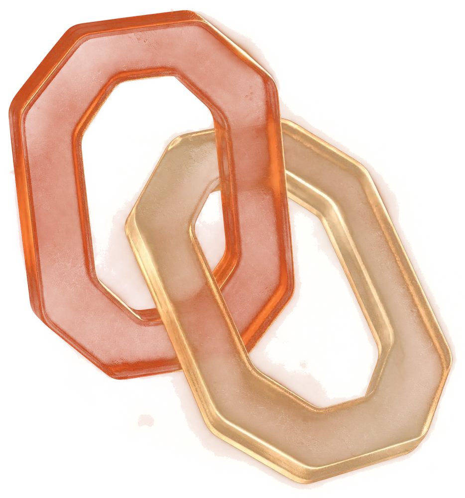 Two interlocking glass loops — one terracotta, one cream — the Flow State mark as an object.